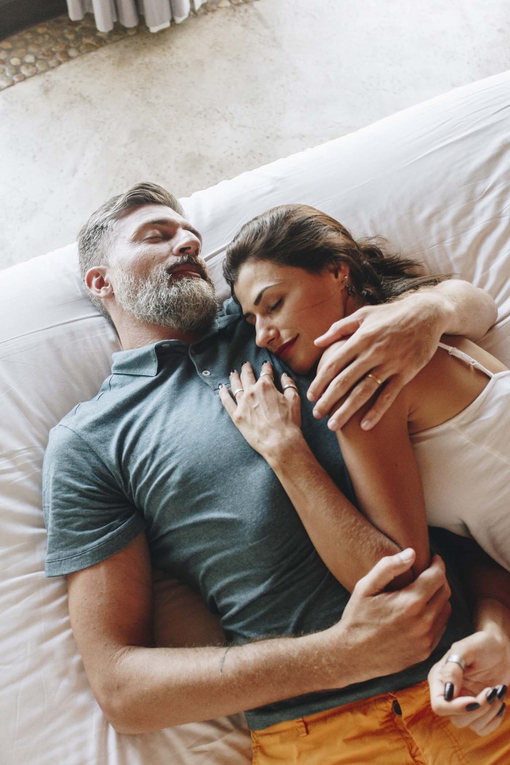 honeymoon-couple-relaxing-in-a-hotel-room-L5R8S4X-1024x1536